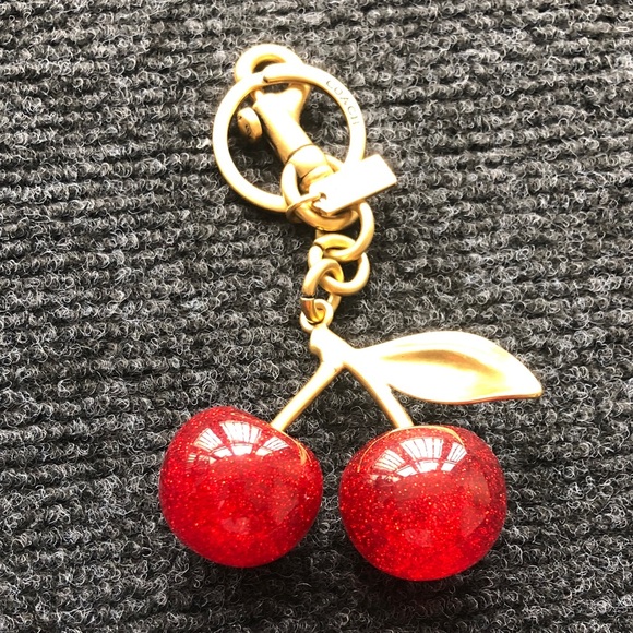 Coach Jewelry - Coach Gold-Tone Cherry Pendant Bracelet Charm with Red Enamel Cherries